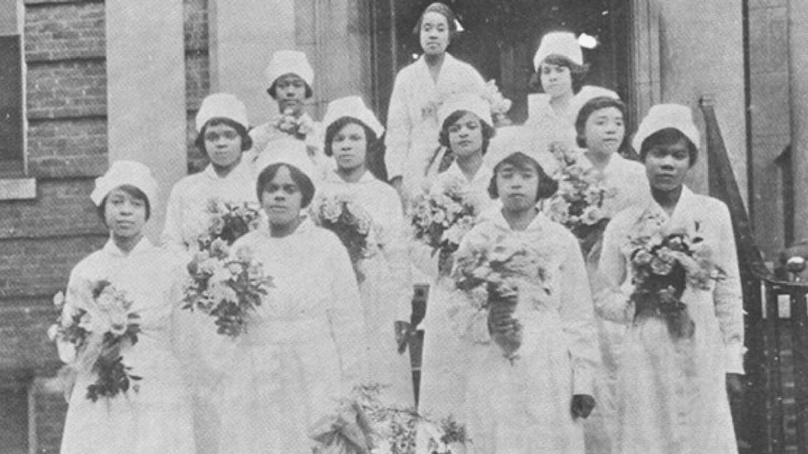 an old photograph of the class of 1924 at their graduation ceremony