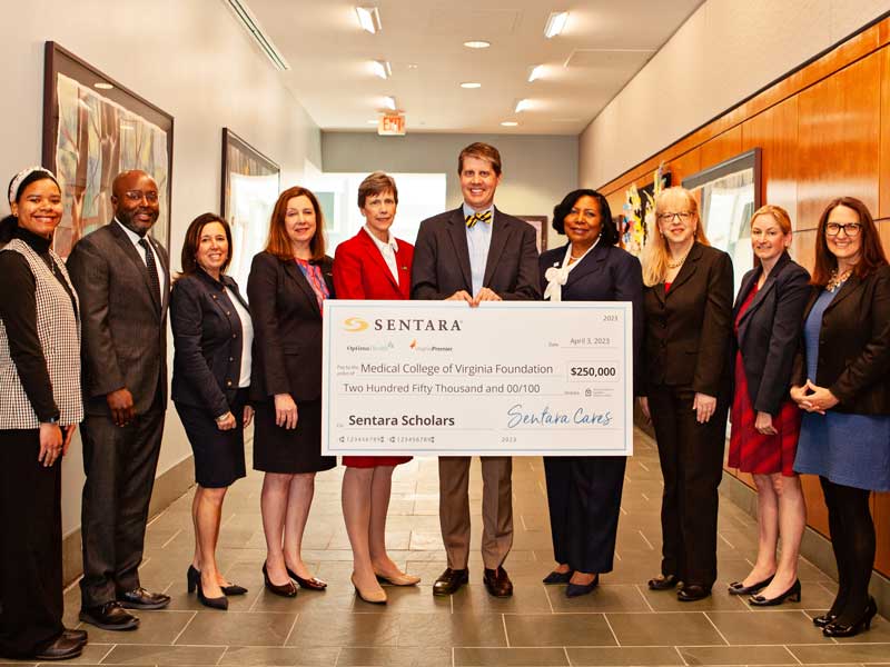 representatives from the v.c.u. school of nursing receive a 250,000 dollar check from sentara healthcare